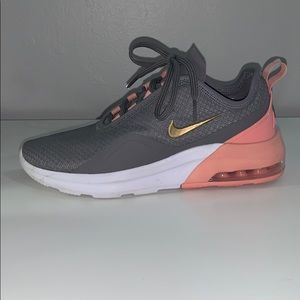 orange, grey and white nike air max motion 2